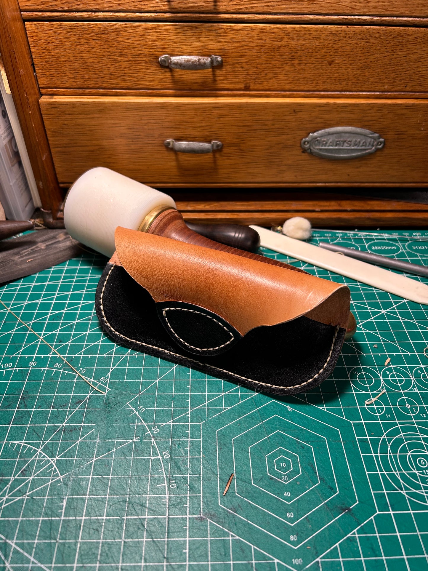 Leather sunglasses holder